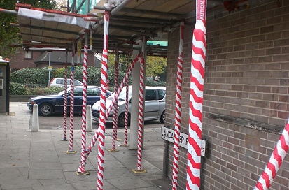 An example of pavement pedestrian protection scaffolding erected according to London Borough of Enfield council regulations.